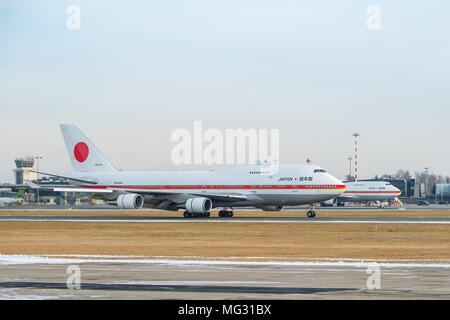 The Japanese Air Force One and Air Force Two Boeing 747 airplanes carying Japanese Prime Minister Shinzo Abe and his staff landed in Riga Airport Stock Photo