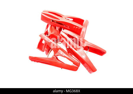 Red Plastic Cloth Clamps Isolated on White Background. Stock Photo