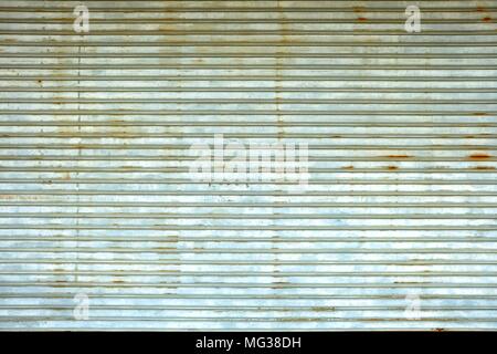 Old Metal Folding Door Background. Stock Photo
