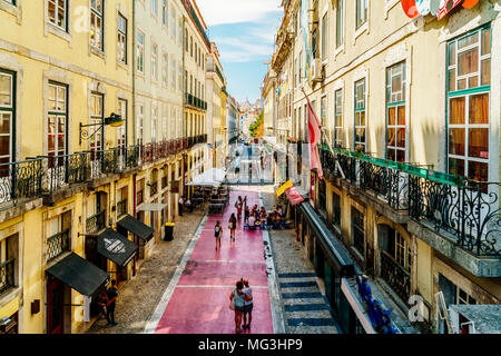 LISBON, PORTUGAL - AUGUST 13, 2017: People Walking On The Pink Street Of Lisbon City