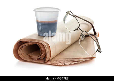 Coffee and newspapers isolated on white background. Stock Photo