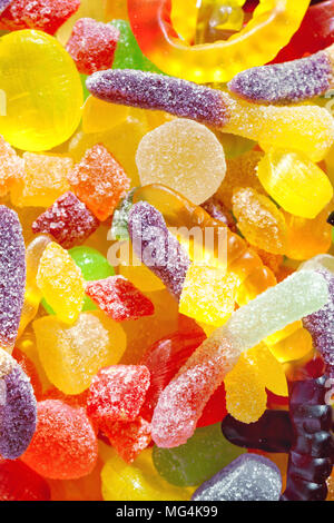 close up a background from colorful sweets of sugar candies. assortment candies view. colorful  sweets isolated on white background Stock Photo