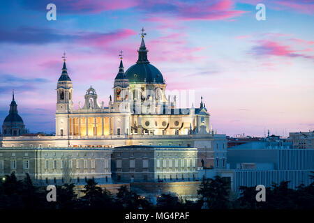 Madrid landmark at night. Landscape of Santa Maria la Real de La Almudena Cathedral and the Royal Palace. Beautiful skyline at Madrid, Spain. Stock Photo