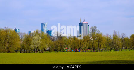 Warsaw, Masovia / Poland - 2018/04/15: Panoramic view of the Warsaw city center district with its skyscrapers seen from the Pole Mokotowskie park Stock Photo