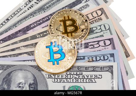 Dollar banknotes with cryptocurrency blue and yellow bitcoins on white background. High resolution photo. Stock Photo