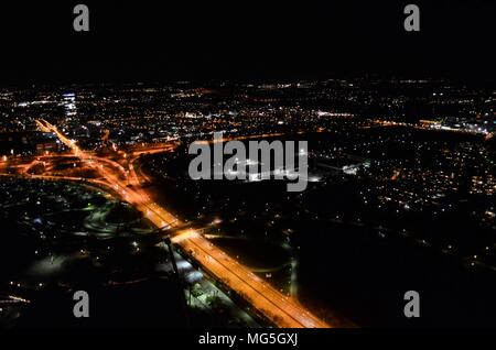 view from olympa tower in Munich during nighttime with amazing sea of lights Stock Photo