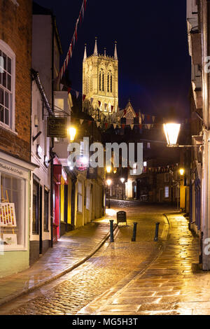 The view up Steep Hill in Lincoln. The road leads to Lincoln Cathedral on top of the hill. Known for pilgrims making their way to the Cathedral Stock Photo