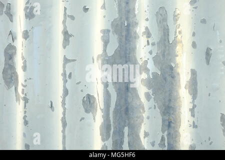 White Peeling Painted Zinc Wall Background. Stock Photo