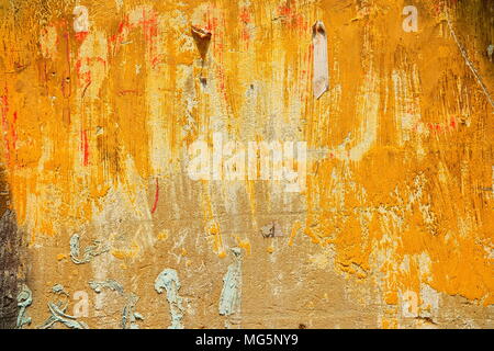 Old Grunge and Yellow Painted Concrete Wall Background. Stock Photo