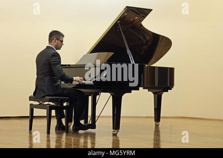 Pianist playing the piano Stock Photo