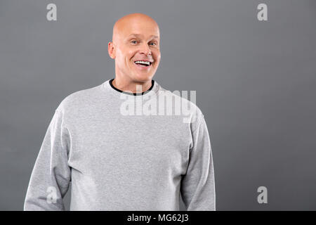 Happy positive man being in a good mood Stock Photo