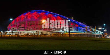 Adler, Sochi, Russia - December 9, 2017: Night panoramic view of illuminated Fisht Olympic Stadium Stock Photo