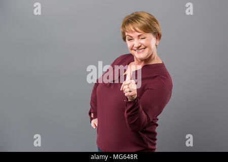 Cheerful adult woman being in a great mood Stock Photo