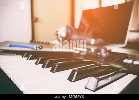 Synth keyboard in a home music studio Stock Photo