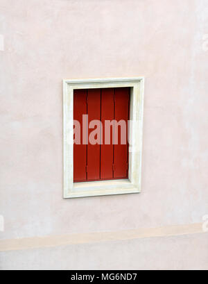 Red shuttered window in Verona, Italy Stock Photo