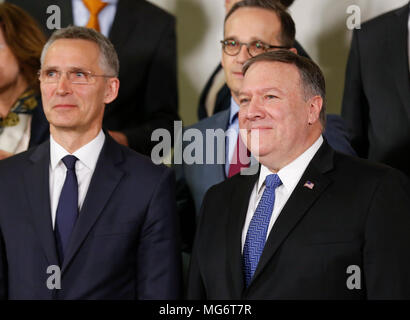 Brussels, Belgium. 27th Apr, 2018. NATO Secretary General Jens Stoltenberg (L) and U.S. Secretary of State Mike Pompeo (R) pose for a family photo during the NATO Foreign Ministers meeting at its headquarters in Brussels, Belgium, April 27, 2018. Credit: Ye Pingfan/Xinhua/Alamy Live News Stock Photo