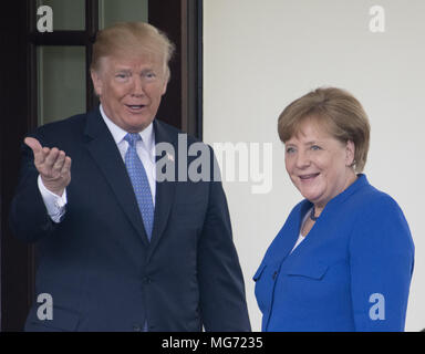 Washington, District of Columbia, USA. 27th Apr, 2018. United States President Donald J. Trump welcomes Chancellor Angela Merkel of Germany to the White House in Washington, DC for talks on Friday. Credit: Ron Sachs/CNP/ZUMA Wire/Alamy Live News Stock Photo