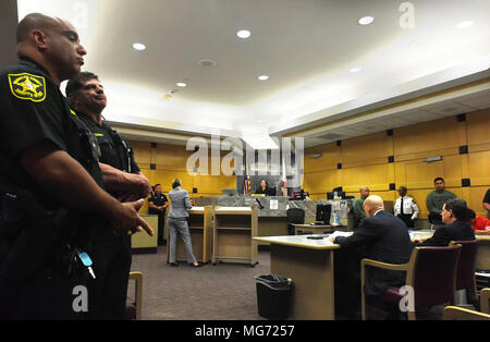North Miami Beach, Florida, USA. 22nd Mar, 2018. Several Broward Sheriff Deputies provide security during Florida school shooting suspect Nikolas Cruz's hearing in front of Circuit Judge Elizabeth Scherer Friday afternoon, April 27, 2018, in Fort Lauderdale, Fl. No trial date was scheduled. Cruz, 19, is charged with 17 counts of murder and 17 counts of attempted murder in the February 14, 2018 school shooting at Marjory Stoneman Douglas High School in Parkland, Fl.Cruz's attorney has said he would plead guilty if guaranteed life without parole, but prosecutors are seeking the death pena