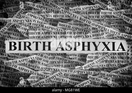 Birth Asphyxia. Torn pieces of paper with the words Birth Asphyxia. Concept Image. Black and White. Closeup. Stock Photo