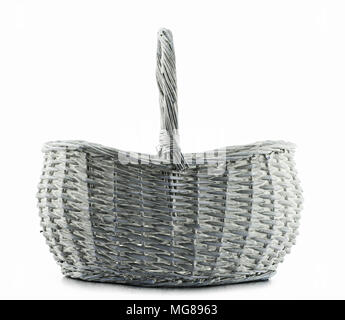 Empty wicker basket isolated on white background. Stock Photo