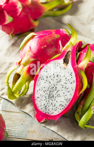 Raw Red Organic Dragon Fruit in a Bunch Stock Photo