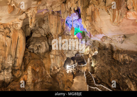 Inside the lit and spacious Tham Chang (or Jang or Jung) Cave in Vang Vieng, Vientiane Province, Laos. Stock Photo