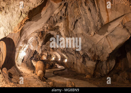 Inside the lit Tham Chang (or Jang or Jung) Cave in Vang Vieng, Vientiane Province, Laos. Stock Photo