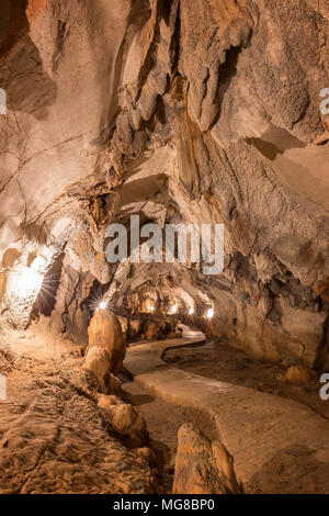 Inside the lit Tham Chang (or Jang or Jung) Cave in Vang Vieng, Vientiane Province, Laos. Stock Photo