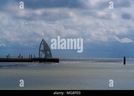 Look-out at the harbour with a blue, light cloudy sky Stock Photo