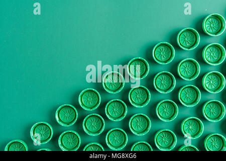 green caps from plastic bottles Stock Photo