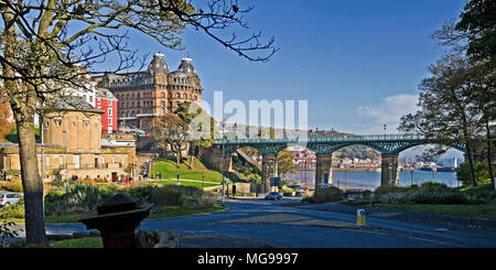 Scarborough’s South Bay, flanked by the Rotunda and Grand Hotel, seen through the arches of the Spa Bridge over Valley Road. Stock Photo
