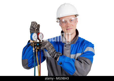 Builder, installer of ventilation with tools in hands Stock Photo