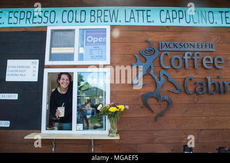 Portrait of a female owner of coffee vending food truck small businessat a food festival Stock Photo