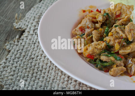 Thai spicy food basil chicken fried rice recipe on table Stock Photo