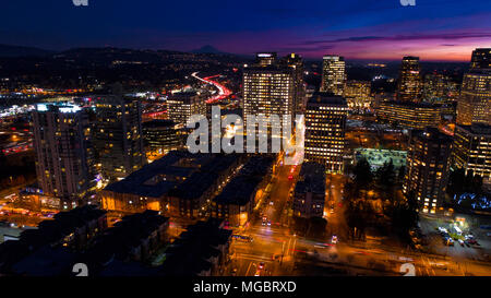 Bellevue Washington Aerial View at Night City Skyline Mount Rainier Background Stock Photo