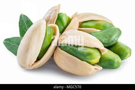 Green pistachio nuts with pistachio shell on white background. Stock Photo