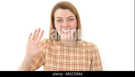 Woman saying hi, waving her hand Positive girl Stock Photo