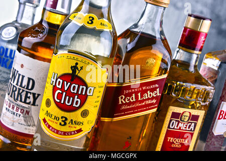 POZNAN, POLAND - MAR 30, 2018: Bottles of assorted global hard liquor brands Stock Photo