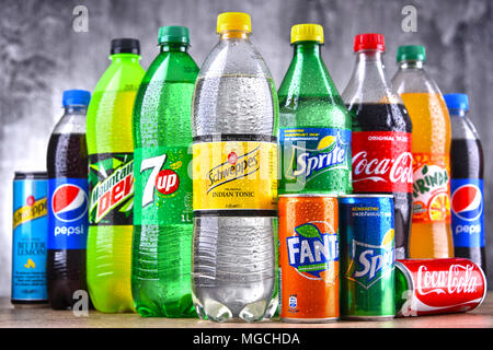 POZNAN, POLAND - APR 6, 2018: Bottles of global soft drink brands ...