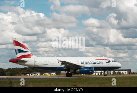 A British Airways plane ready for take off on the runway at Leeds Bradford Airport Stock Photo