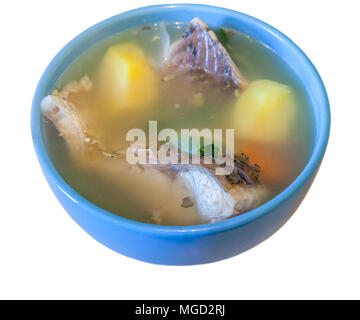 Bowl of fish soup isolated on white background. Stock Photo