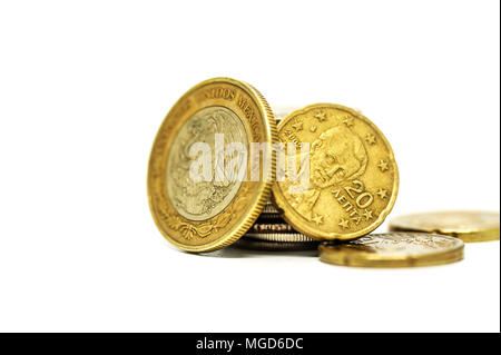 Coin pile, Mexican peso money on solid white background. Stock Photo