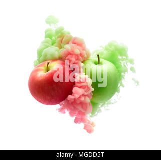 Red and green apples on ink isolated over white background Stock Photo