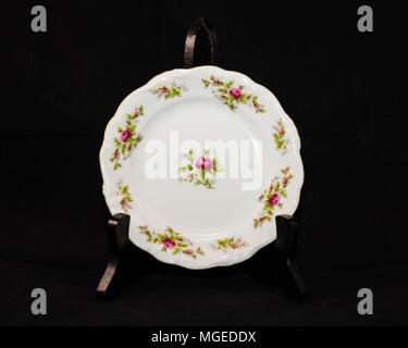 a hand painted rose pattern china small plate Stock Photo