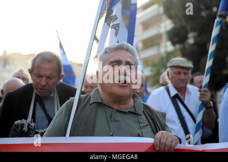 Athens, Greece. 27th Apr, 2018. reeks demonstrate in Athens rembering the anniversary of the sart of Occupation of Athens by the Nazis in WW2 and demanding from Germany to pay possible war reparations over the damage done by the Nazi war machine in Greece.It shoud be noted that German state insists the issue of compensation was previously setled in 1990. Credit: George Panagakis/Pacific Press/Alamy Live News Stock Photo