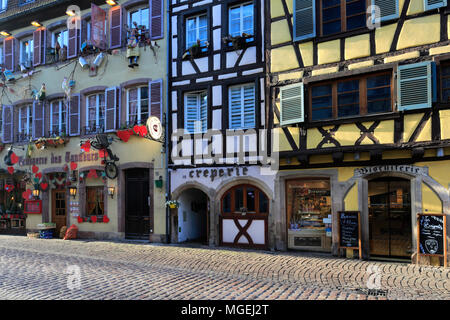 Shops and colorful façades of timber framed houses, Colmar town, Alsatian wine area, Alsace, France, Europe Stock Photo