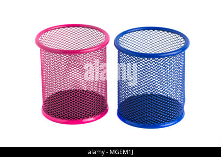 Red and blue basket for pens and pencils on the white background. Stock Photo
