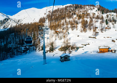 View of snowy Alps with cable car at Zermatt Village in Switzerland Stock Photo
