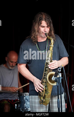 Bodrum, Turkey-August 2017: Ilhan Ersahin rehearsal at Off Gumusluk club as part of Turkcell Bodrum Jazz festival: Saxophone player Ilhan Ersahin and  Stock Photo