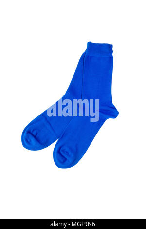 A pair of bamboo socks in modern vibrant blue color on white background. Top view. Stock Photo